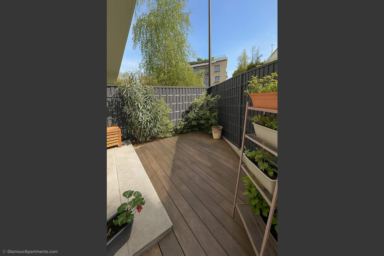 The terrace by the cedar
